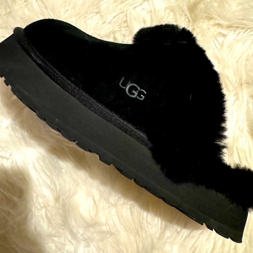Black platform UGG slippers in excellent condition!